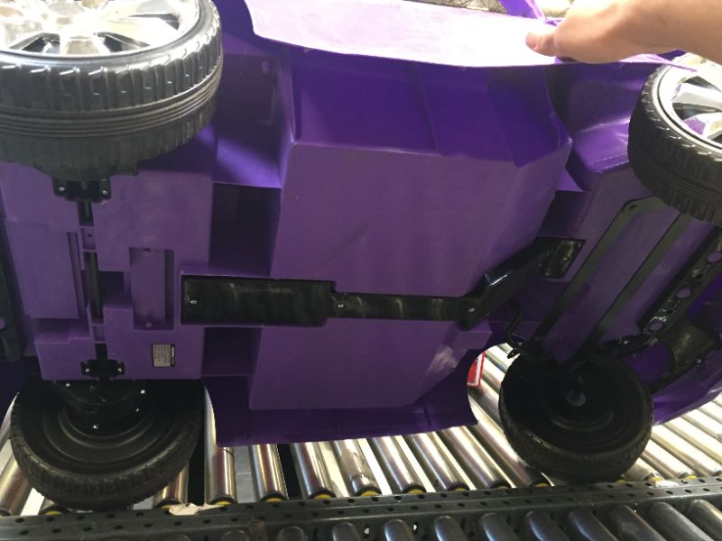 Photo 3 of GT Coupe Ride-On Toy by Kid Trax, purple, rechargeable powered, 12 volts, sports car, cool wheels