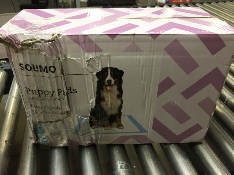 Photo 2 of Amazon Brand - Solimo Super Absorbent Puppy Pads, Unscented, X-Large, 50 Count DAMAGES TO BOX
BRAND NEW