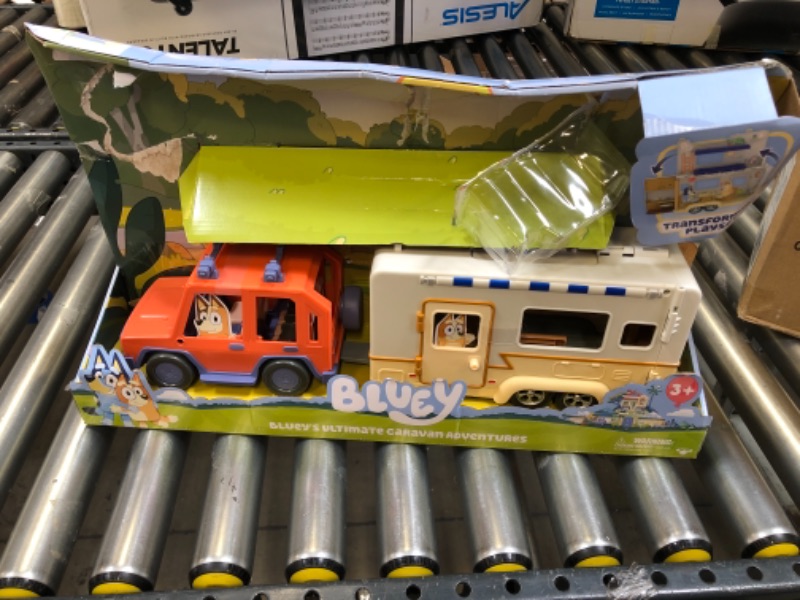 Photo 2 of Bluey Ultimate Caravan Adventures - Caravan Playset and Three 2.5-3" Figures & 4WD Family Vehicle with 2 Surfboards
