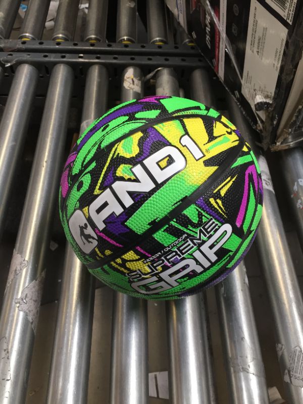 Photo 2 of AND1 Supreme Grip Spongetech Rubber Basketball- Regulation Size Streetball (29.5"), Made for Indoor and Outdoor Basketball Games (Green/Purple)
