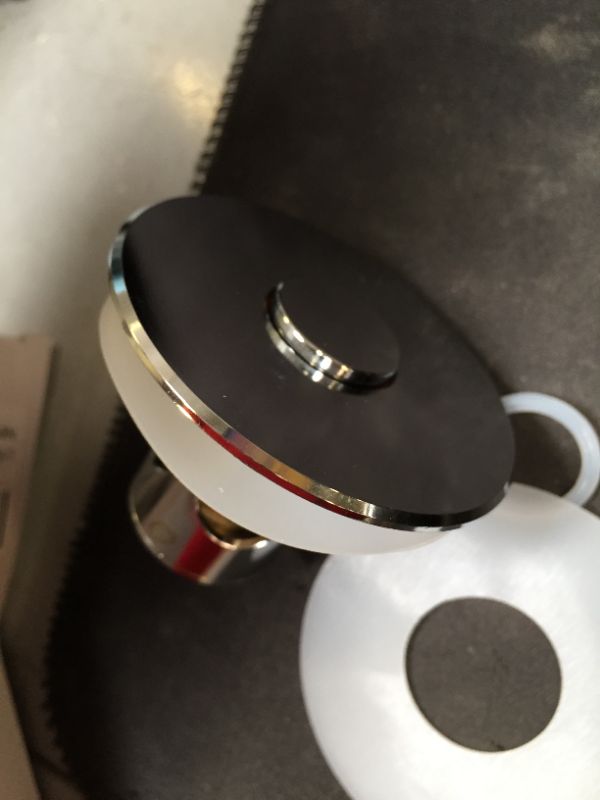 Photo 1 of universal bathroom stopper