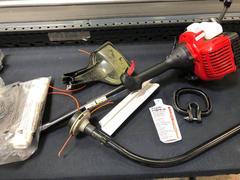 Photo 8 of 25 cc 2-Stroke Curved Shaft Gas Trimmer with Fixed Line Trimmer Head
