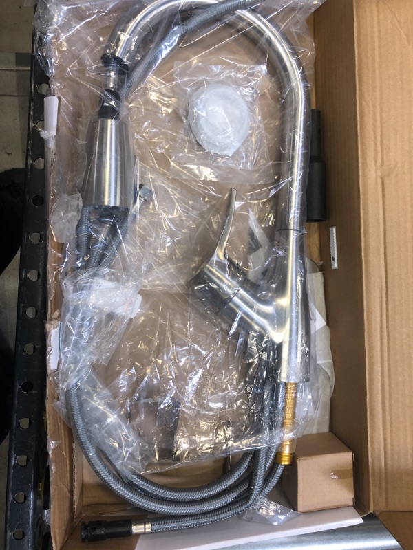 Photo 1 of Peerless Apex One Handle Pull-Down Kitchen Faucet with Soap Dispenser in Stainless
Factory Sealed. Corner of Box Damaged