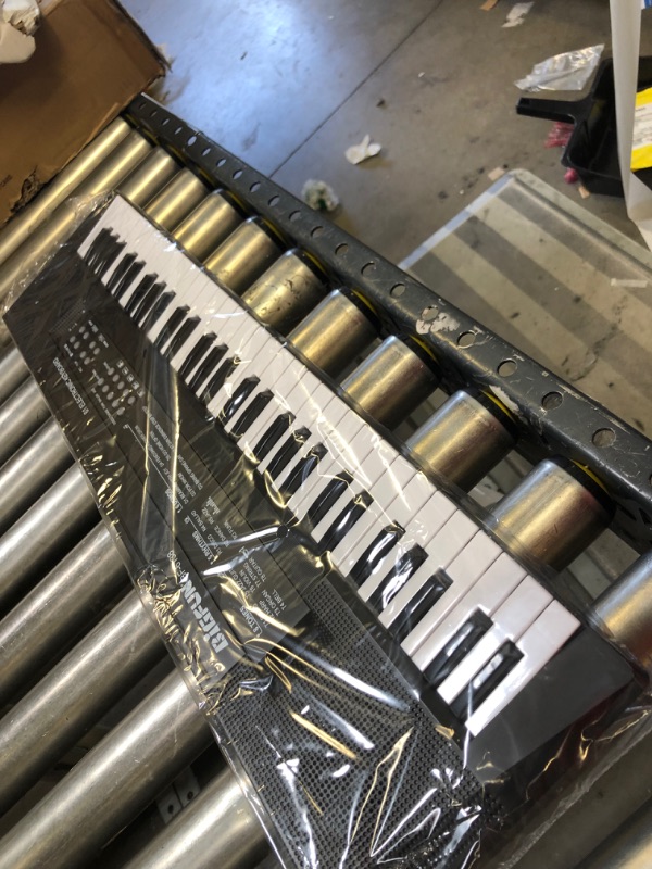 Photo 1 of Kids Piano Keyboard 61 Keys Electronic Piano for Kids Portable Piano with Microphone Music Educational Toy Gift for Kids Girls Boys
