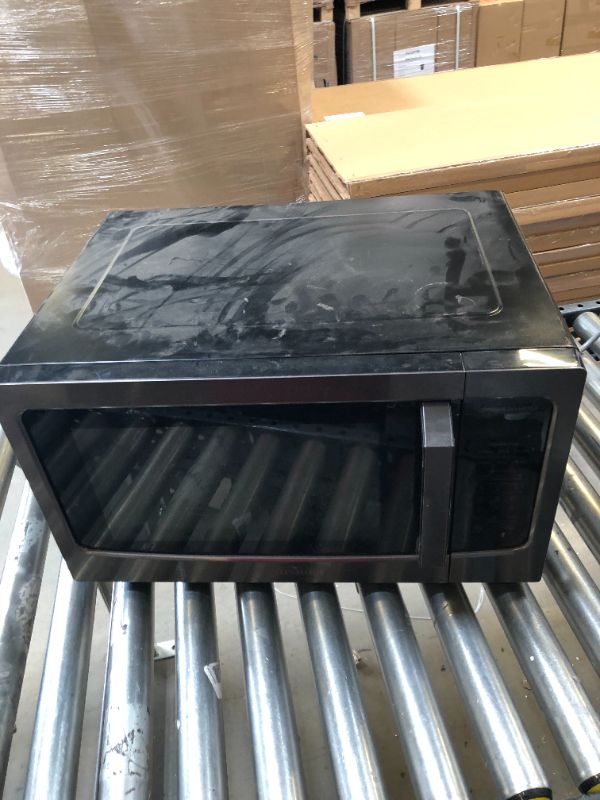 Photo 1 of Toshiba ML-EM45PIT(SS) Microwave Oven with Origin Inverter Technology, LCD Display and Smart Sensor, 1.6 Cu.ft, Stainless Steel
(DIRTY)