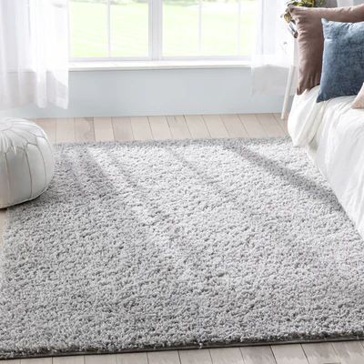 Photo 1 of 5'3" X 7'3" Emerson Plain Glam Shag Light Grey Rug, DIRTY 
