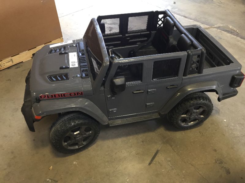 Photo 2 of 12 Volt Jeep Gladiator Battery Powered Ride On Vehicle, in Gray by Hyper Toys, NO CHARGER, TURNS ON BUT DOES NOT DRIVE, DIRTY 
