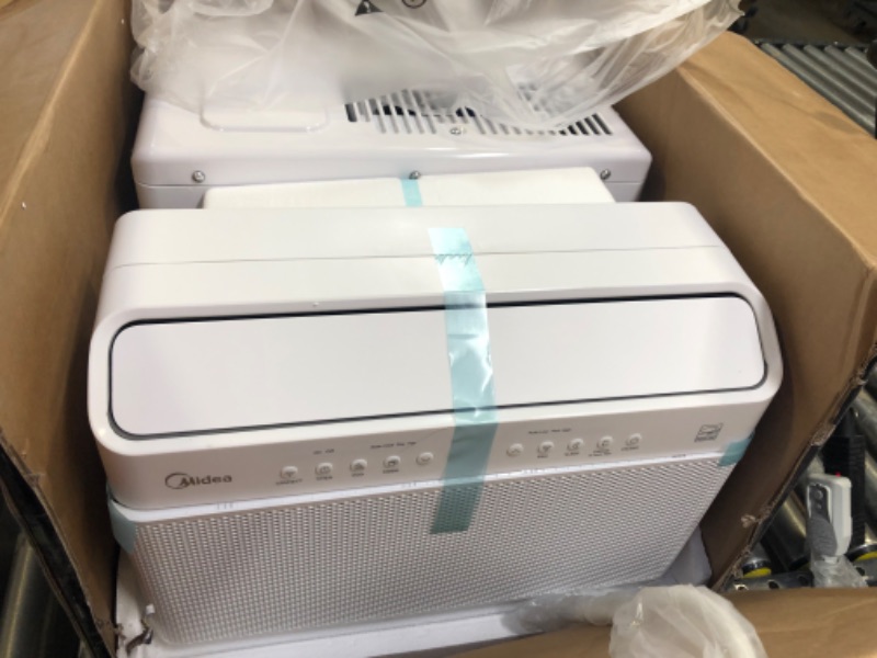 Photo 1 of Midea 12,000 BTU U-Shaped Smart Inverter Window Air Conditioner–Cools up to 550 Sq. Ft., Ultra Quiet with Open Window Flexibility, Works with Alexa/Google Assistant, 35% Energy Savings, Remote Control
