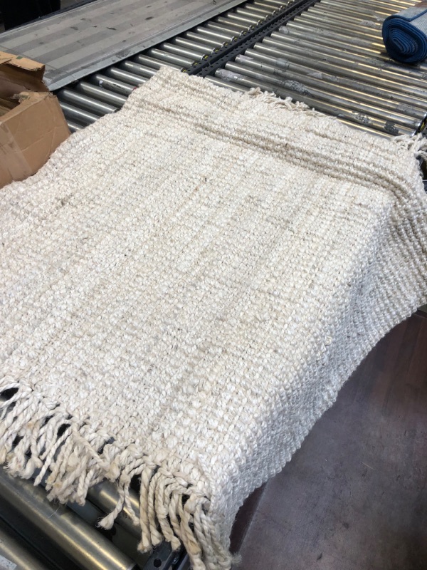 Photo 2 of 44 X 46 WHITE WOVEN RUG-----------(DIRTY)