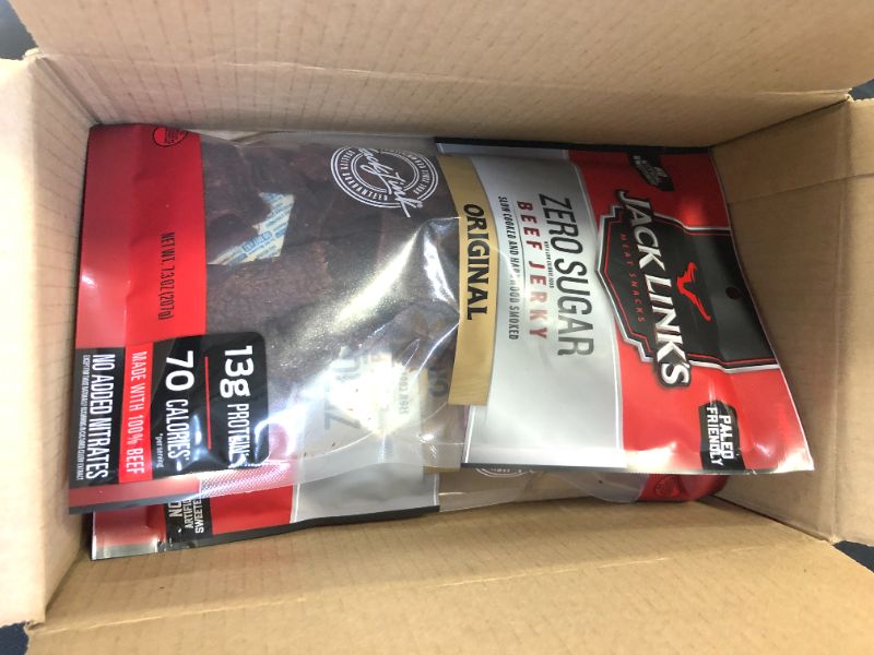 Photo 1 of 2 PACK OF BEEF JERKY EXP 2/14/22