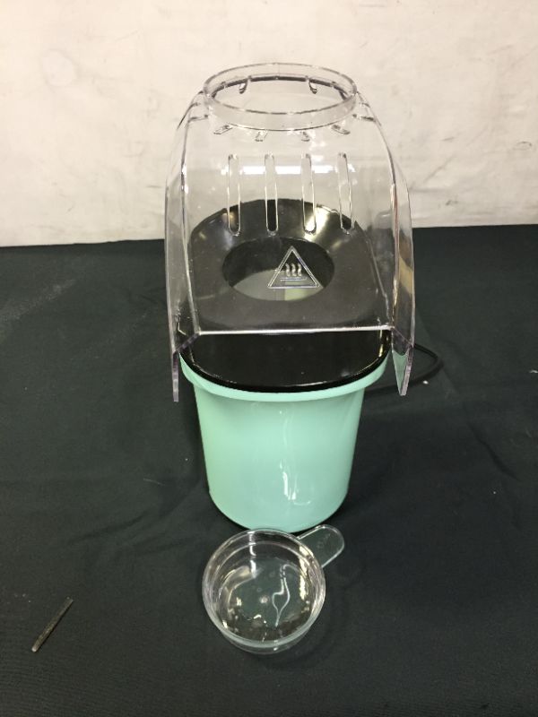 Photo 4 of Dash DAPP150GBAQ04 Dash Popcorn Machine, Aqua
(FOOD STAINS ON ITEM)