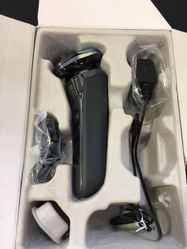 Photo 1 of Philips Norelco Shaver 7100, Rechargeable Wet & Dry Electric Shaver with SenseIQ Technology and Pop-up Trimmer S7788/82
1 Count (Pack of 1)