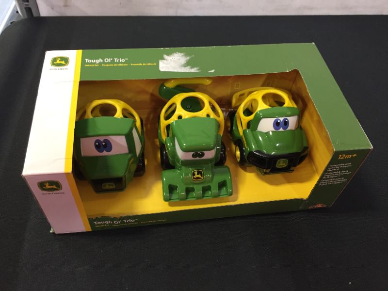 Photo 2 of Bright Starts Oball Go Grippers John Deere Construction Crusiers Trailer Set Push Vehicle Set, Tough Ol' Trio, Ages 12 Months and up (MINOR DAMAGES TO PACKAGING)
