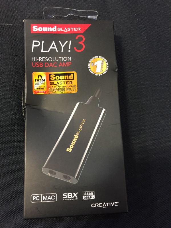 Photo 2 of Creative Labs Sound Blaster Play! 3 External USB Sound Adapter for Windows and Mac. Plug and Play (No Drivers Required). Upgrade to 24-Bit 96Khz Playback
(MINOR DAMAGES TO PACKAGING FROM EXPOSURE)
