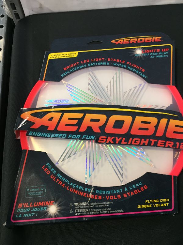 Photo 1 of AEROBIE SKYLIGHTER DISC 12" RED DAMAGES TO PACKAGING 