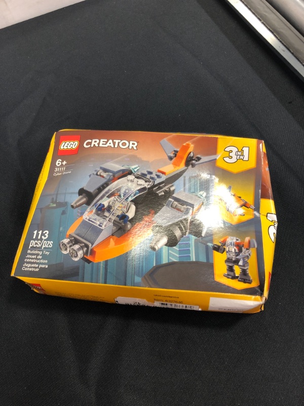 Photo 2 of LEGO Creator 3in1 Cyber Drone 31111 3in1 Toy Building Kit Featuring a Cyber Drone, Cyber Mech and Cyber Scooter, New 2021 (113 Pieces)
sealed - box has minor damage 