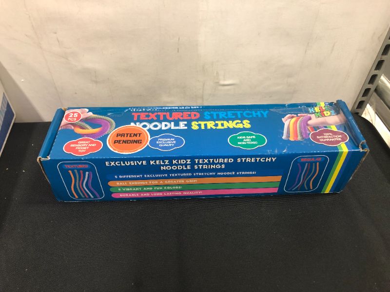 Photo 2 of KELZ KIDZ Texturodos - Durable Textured (Patent Pending) Stretchy String Fidget and Sensory Toy - Individually Packaged Monkey Noodles - Fun Therapeutic Stress and Anxiety Reliever for Kids (25 Pack)
