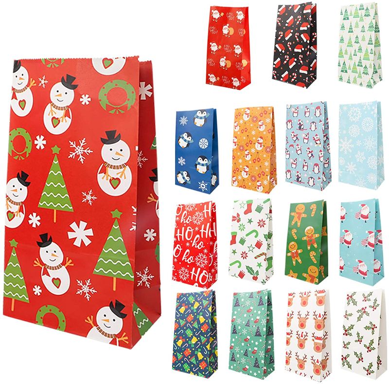 Photo 1 of 96pcs Christmas Goody Bags, 16 Assorted Christmas Designs Treat Bags for Classrooms, Party Favors, Kraft Holiday Goody
