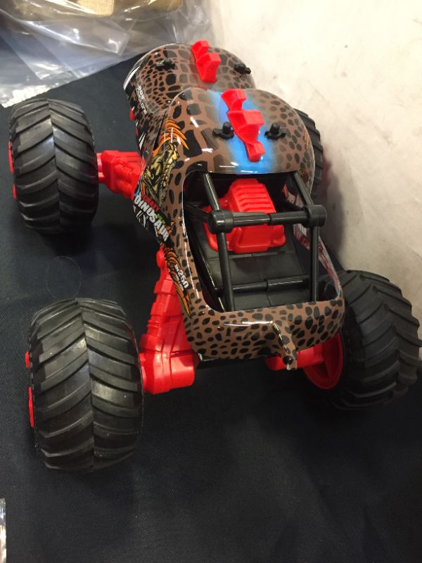 Photo 5 of 1:16 Dinosaur RC Cars Monster Trucks for Boys Remote Control Car for Kids Toys Off Road 20+MPH 2.4GHz All Terrain 4WD Car Toys for 6 7 8 Years Old Boys 2 Rechargeable Battery Birthday Gifts