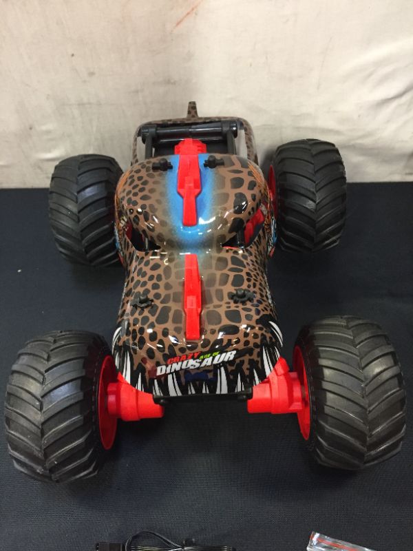 Photo 4 of 1:16 Dinosaur RC Cars Monster Trucks for Boys Remote Control Car for Kids Toys Off Road 20+MPH 2.4GHz All Terrain 4WD Car Toys for 6 7 8 Years Old Boys 2 Rechargeable Battery Birthday Gifts