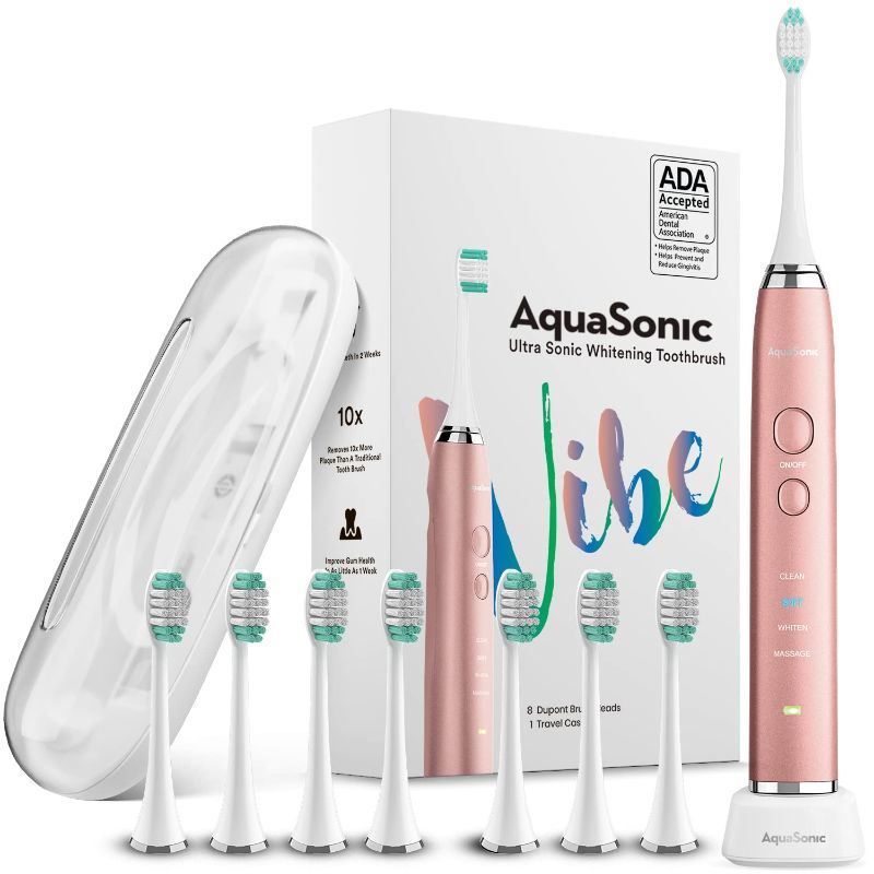 Photo 1 of AquaSonic Vibe Series Ultra Whitening Toothbrush – ADA Accepted Electric Toothbrush - 8 Brush Heads & Travel Case - Ultra Sonic Motor & Wireless Charging - 4 Modes w Smart Timer – Satin Rose Gold - SEALED 
