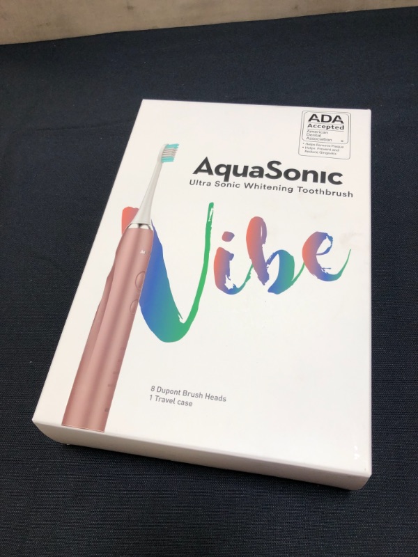 Photo 2 of AquaSonic Vibe Series Ultra Whitening Toothbrush – ADA Accepted Electric Toothbrush - 8 Brush Heads & Travel Case - Ultra Sonic Motor & Wireless Charging - 4 Modes w Smart Timer – Satin Rose Gold - SEALED 
