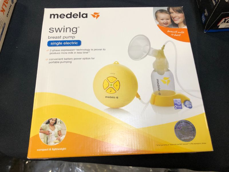 Photo 2 of Medela, Swing, Single Electric Breast Pump, Compact and Lightweight Motor, 2-Phase Expression Technology, Convenient AC Adaptor or Battery Power, Single Pumping Kit, Easy to Use Vacuum Control