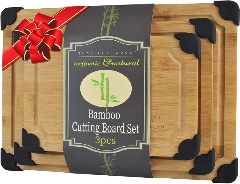 Photo 1 of Bamboo Cutting Board Set of 3 with Anti-Slip Firm Grip Corners and Deep Juice Grooves; Organic Chopping Board for Meats and Vegetables; Cheese Board and Serving Tray