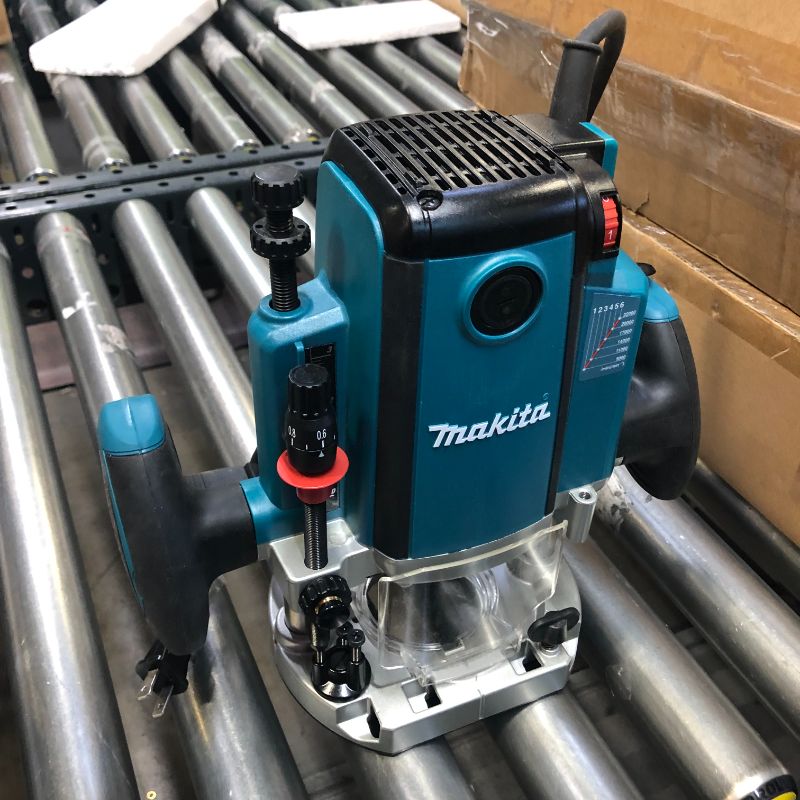Photo 1 of Makita RP2301FC 3-1/4 HP* Plunge Router, with Variable Speed
