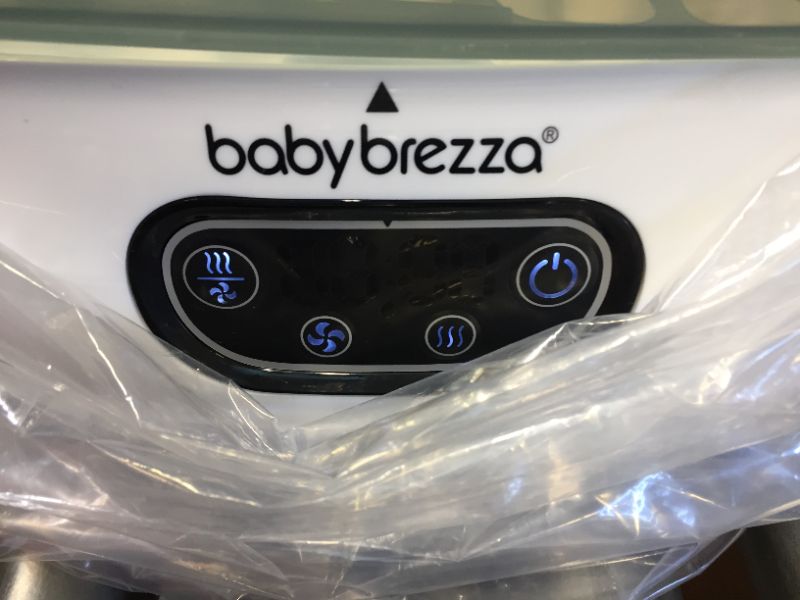 Photo 4 of Baby Brezza Baby Bottle Sterilizer and Dryer Advanced – Electric Steam Sterilization Machine – Universal Sterilizing for All Bottles: Plastic + Glass + Pacifiers + Breast Pump Parts - HEPA Filtration
