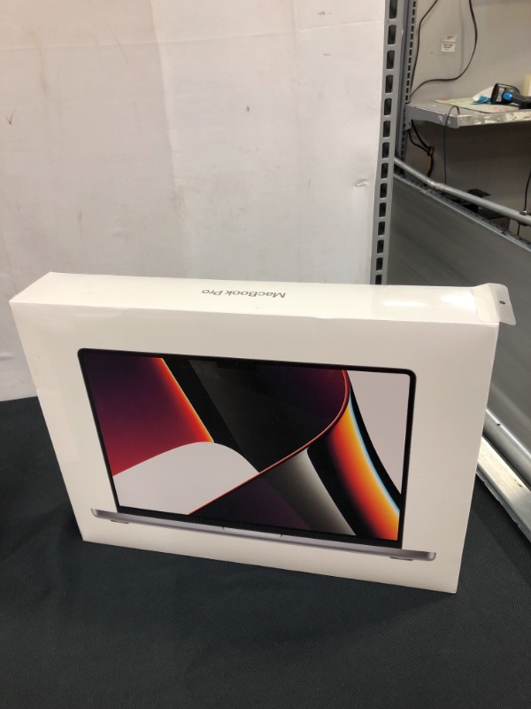 Photo 1 of MacBook Pro 14" Laptop - Apple M1 Pro chip - 16GB Memory - 512GB SSD (Latest Model) - Space Gray - FACTORY SEALED 
