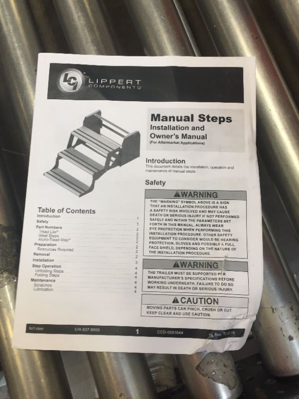 Photo 4 of Lippert Components 432696 Alumi-Tread Triple Manual Step , Black---ITEM IS DIRTY---
