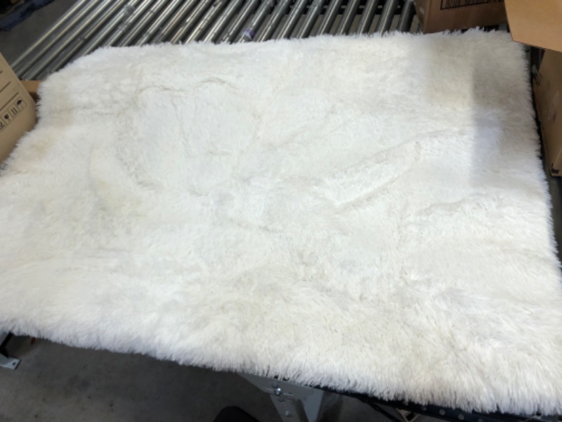 Photo 1 of 8'x5' fuzzy white rug 