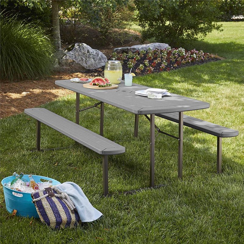 Photo 1 of Cosco Outdoor Living 87902DGR1E 6 ft. Folding Blow Mold, Dark Wood Grain with Gray Legs Picnic Table---BOX IS DAMAGED---
