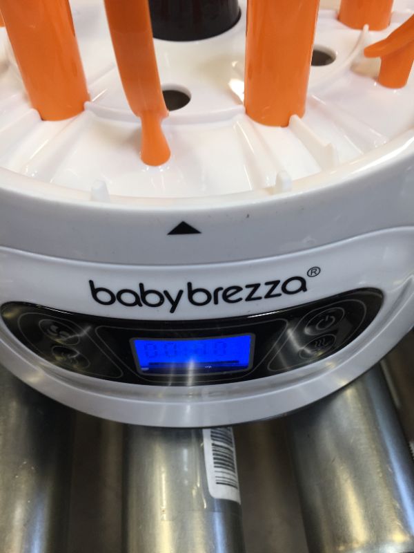 Photo 4 of Baby Brezza Baby Bottle Sterilizer and Dryer Machine – Electric Steam Sterilization - Universal Fit - Pacifiers, Glass, Plastic, and Newborn Feeding Bottles---ITEM IS DIRTY---
