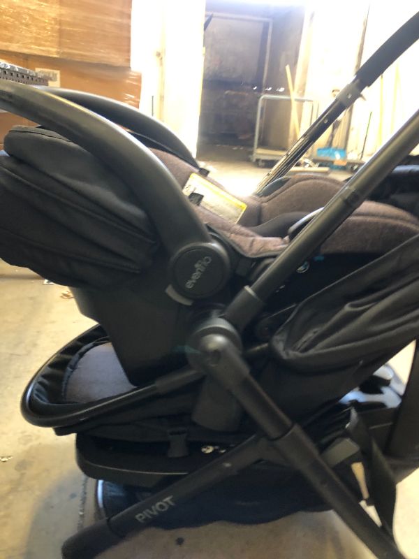 Photo 3 of Evenflo Pivot Modular Travel System With SafeMax Car Seat
