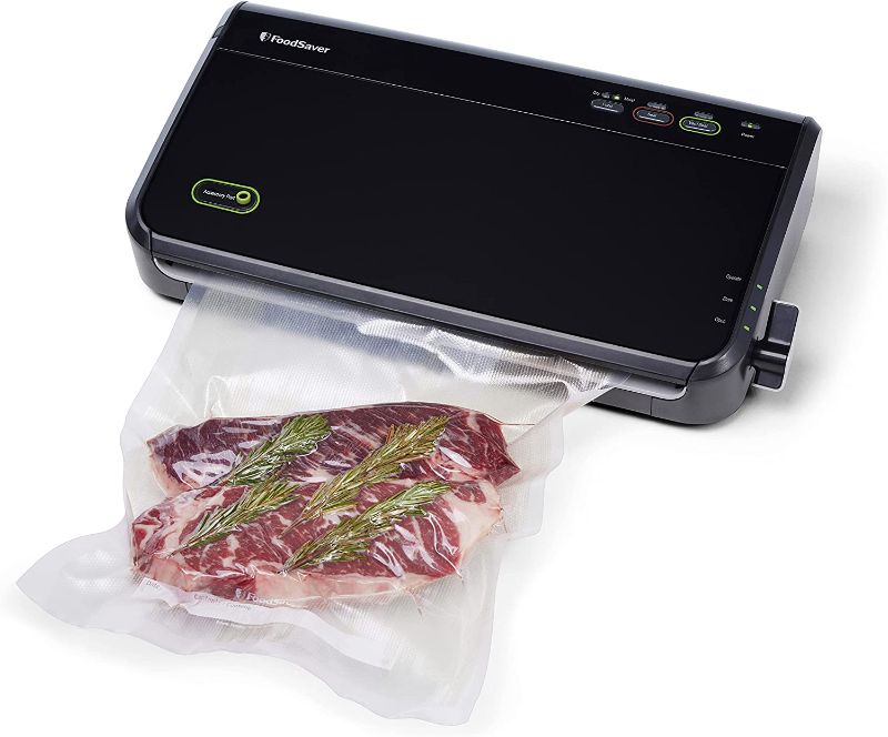 Photo 1 of FoodSaver Vacuum Sealer Machine with Automatic Bag Detection, Sealer Bags and Roll, and Handheld Vacuum Sealer for Airtight Food Storage and Sous Vide, Silver
