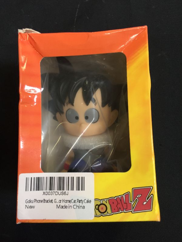 Photo 2 of Goku Phone Bracket, Goku Shaking Head Car Decoration, Dragon Ball Z Home Decoration, Goku Decor for Home,Car,Party Cake DAMAGES TO PACKAGING 
