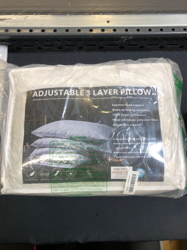 Photo 1 of adjustable 3 layer pillow 