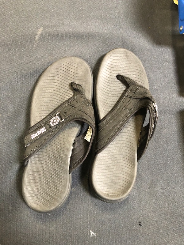 Photo 1 of size 8 adult flip flops 