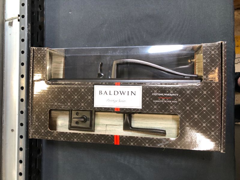 Photo 1 of Baldwin Torrey Pines Single Cylinder Front Door Handleset Featuring SmartKey Security in Venetian Bronze, Prestige Series with a Modern Contemporary Slim Door Handleset and Square Lever
