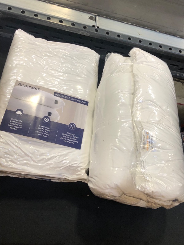 Photo 2 of Accuratex adjustable loft pillow 2 pk [ 1 pillow is used needs to be washed and lint rolled / 1 pillow is brand new factory sealed ] 