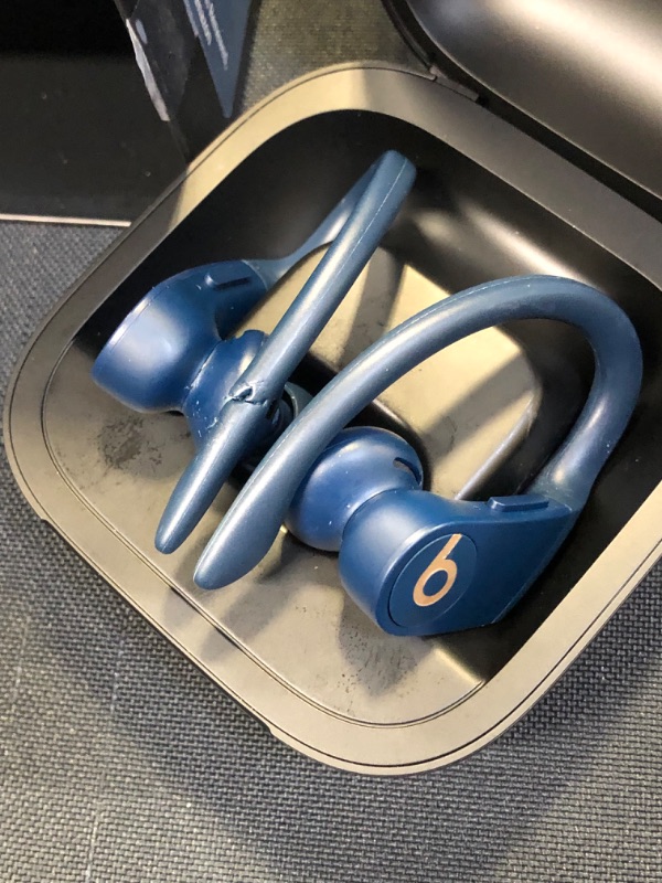 Photo 8 of Powerbeats Pro Wireless Earphones - Apple H1 Headphone Chip, Class 1 Bluetooth, 9 Hours of Listening Time, Sweat Resistant Earbuds, Built-in Microphone - Navy [ has bite marks on 1 ear bud / both earbuds are dirty and need to be cleaned ] power works and 