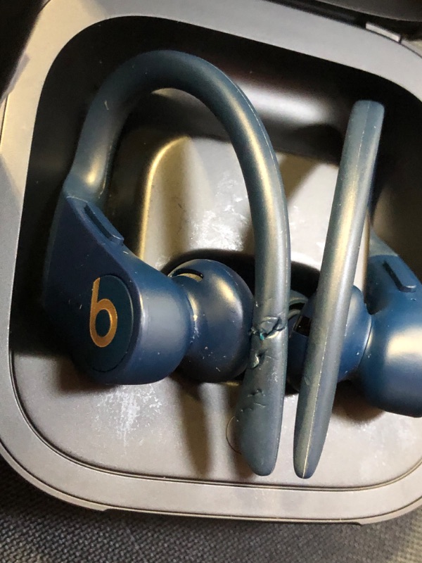 Photo 3 of Powerbeats Pro Wireless Earphones - Apple H1 Headphone Chip, Class 1 Bluetooth, 9 Hours of Listening Time, Sweat Resistant Earbuds, Built-in Microphone - Navy [ has bite marks on 1 ear bud / both earbuds are dirty and need to be cleaned ] power works and 
