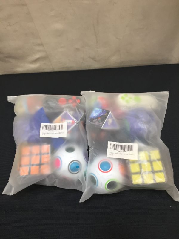 Photo 1 of Fidget Toy Set 10 Pcs, Magic Cube Fidget Rings Infinity Cube Fidget Pad Flippy Chain, Handheld Toys for Sensory Kids & Adults
2 pack (color and design may vary)