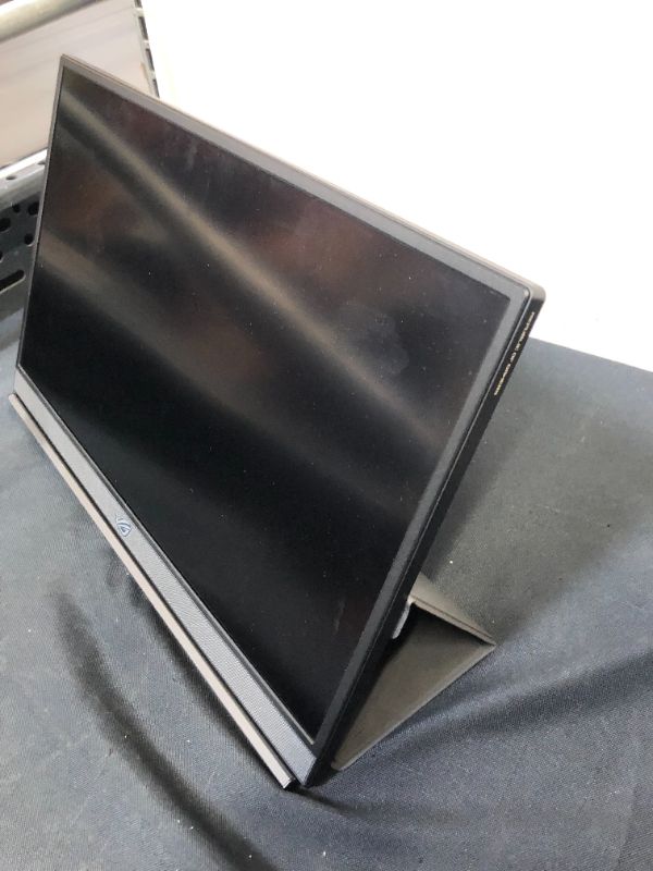 Photo 7 of ASUS ROG Strix 17.3" 1080P Portable Gaming Monitor (XG17AHPE) - Full HD, IPS, 240Hz, 3ms, Adaptive-Sync, Smart Case, Ultra-slim, USB-C Power Delivery, Micro HDMI, For Laptop, PC, Phone, Console, Black --- powers on unable to fully test,  missing power cor