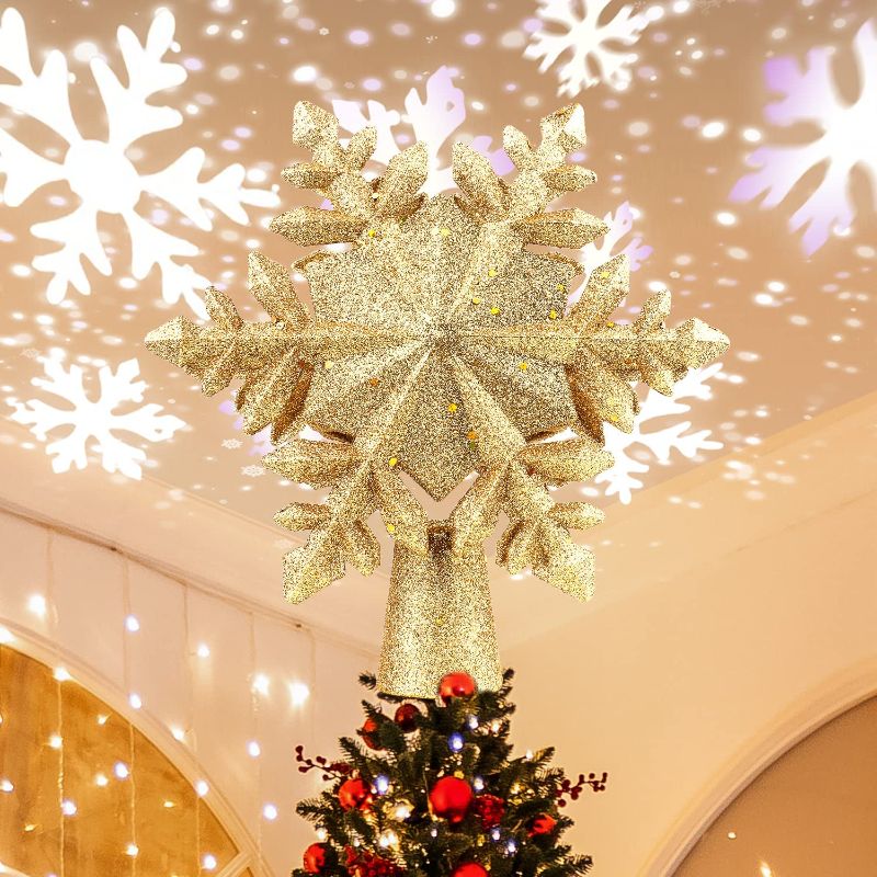 Photo 1 of  Snowflake Tree Topper, Christmas Tree Topper Lighted with Rotating Snowflake LED Projector,3D Gold Glitter Christmas Tree Topper
