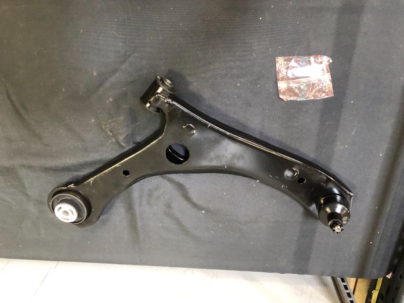Photo 1 of AXB2606332 CONTROL ARM - USED AND DIRTY