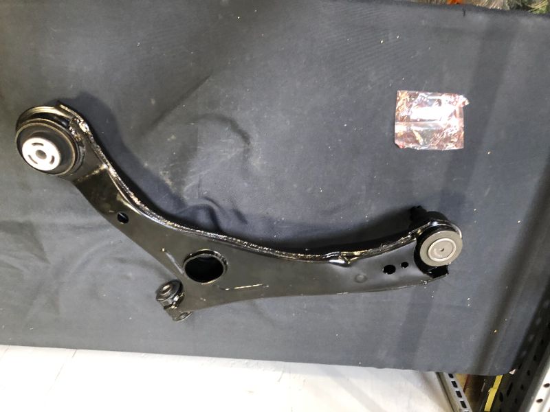 Photo 2 of AXB2606332 CONTROL ARM - USED AND DIRTY