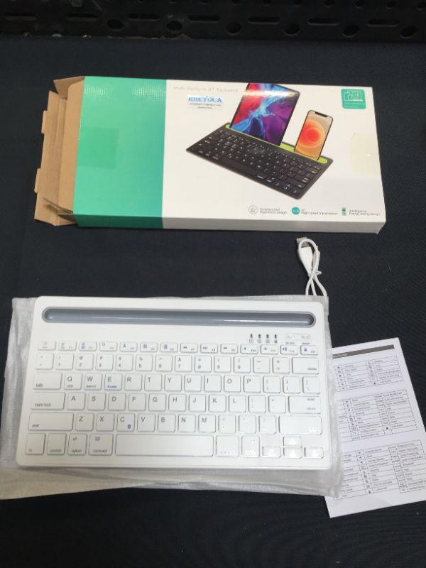 Photo 2 of RIIEYOCA Multi-Devcie Bluetooth Keyboard, Dual Mode & Rechargeable Slim Wireless Keyboard, Switch to 2 Devices Compatible for iOS/Android/Windows/Desktop/PC/Notebook/Tablet/Smartphones (White)